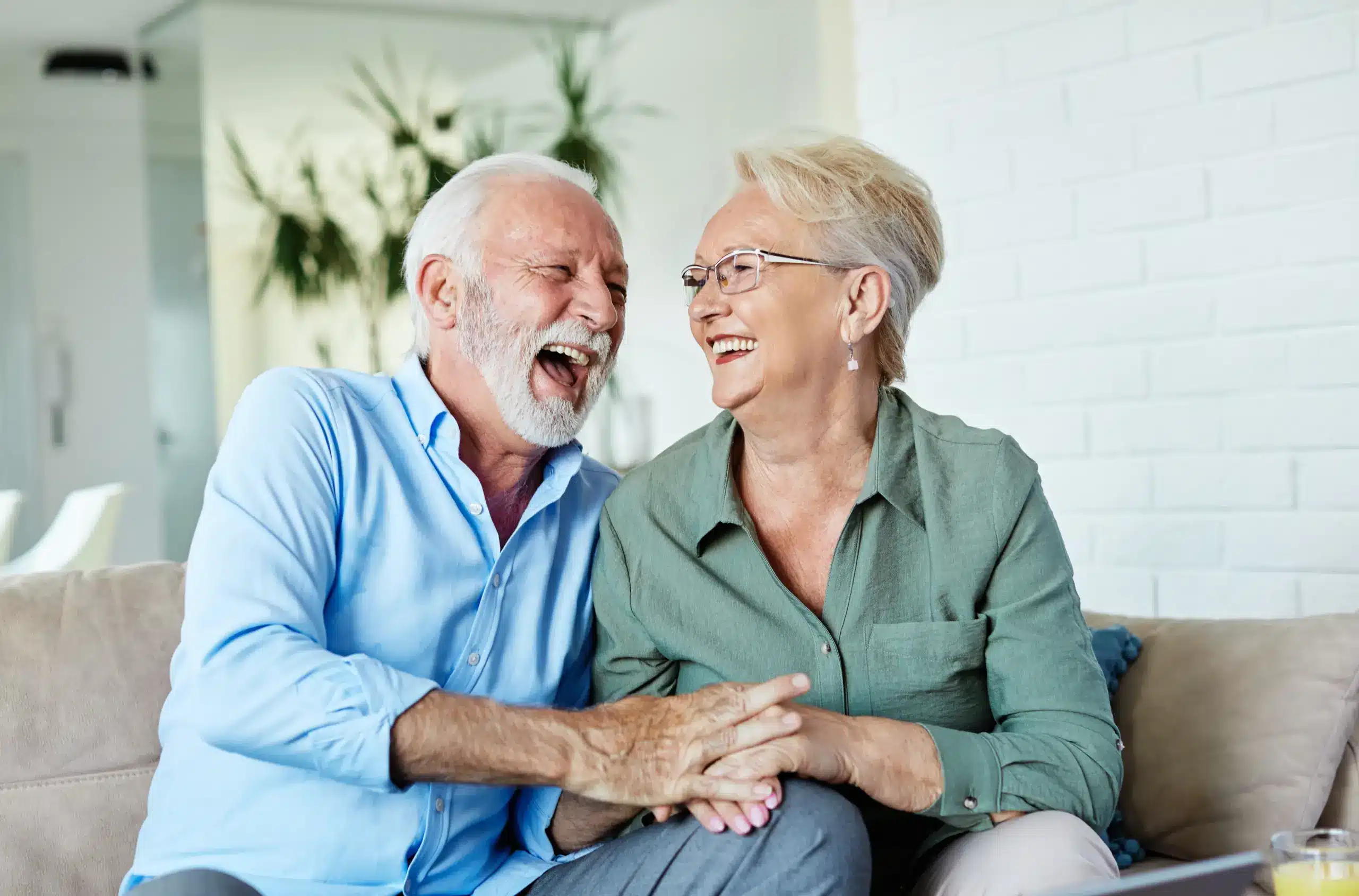 happy couple after teeth restoration crowns in Aurora IL